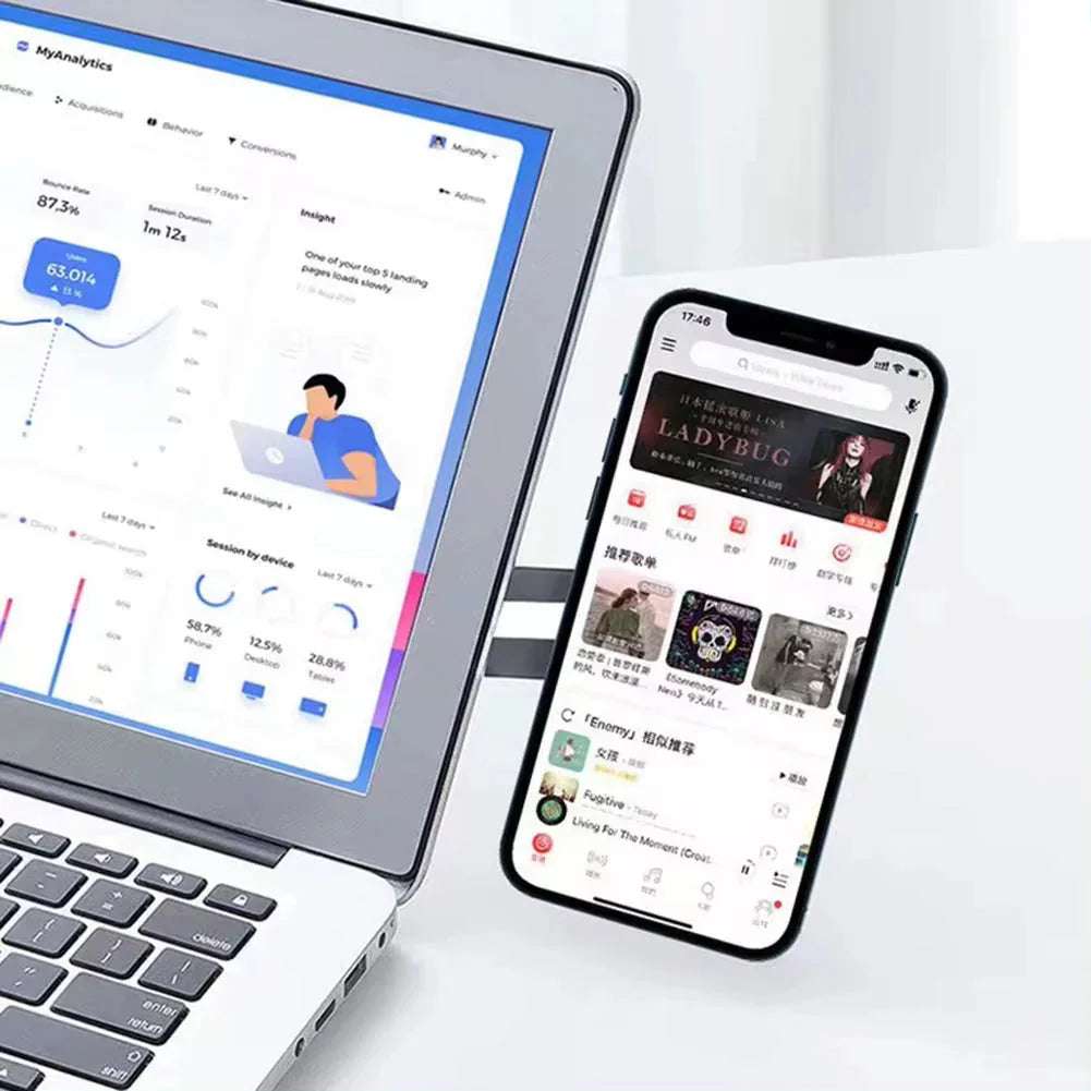 Support téléphone magnétique pliable avec chargeur sans fil 15W compatible Tesla et laptop, design compact et maintien stable.